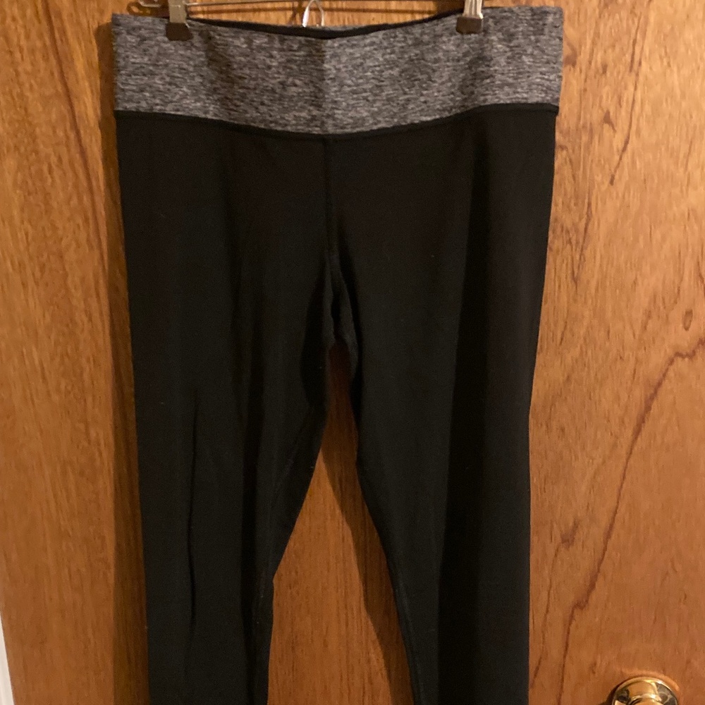 PINK black leggings with PINK logo on left bottom side of leg;  size Medium